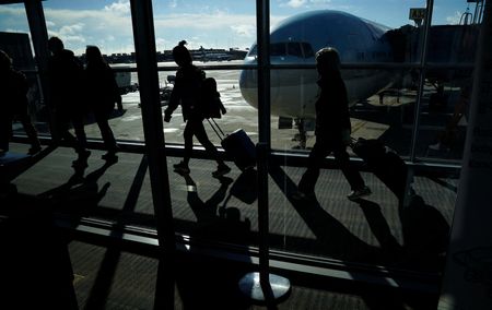 Exclusive-US scrutinizing airline frequent flyer programs