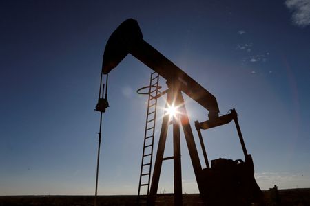 Oil drops slightly on China demand concerns but records weekly gain