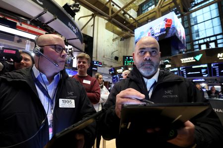 Investors still flock to cash as stocks hit record highs